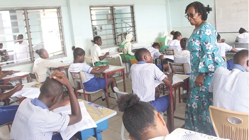 Wendy Addy-Lamptey, Head of the National Office of the West African Examinations Council, observing some candidates writing the Social Studies paper at the  St. Paul’s Lutheran School at Kanda in Accra. Picture: ESTHER ADJORKOR ADJEI